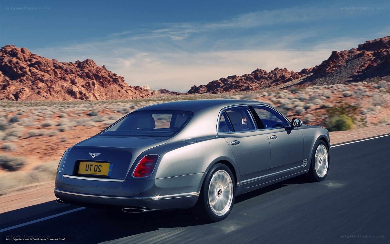 Bentley driving in desert