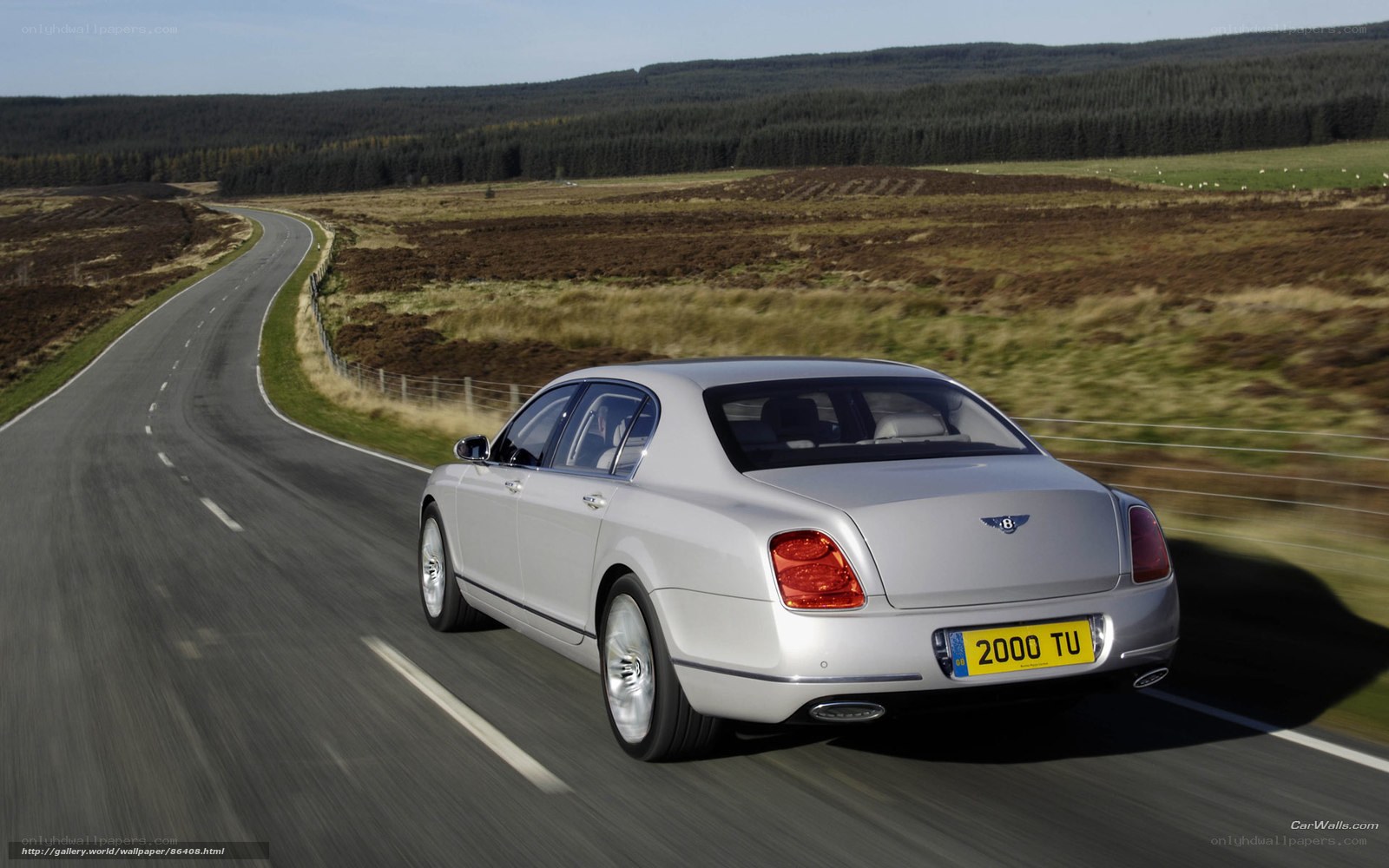 Bentley driving on country road