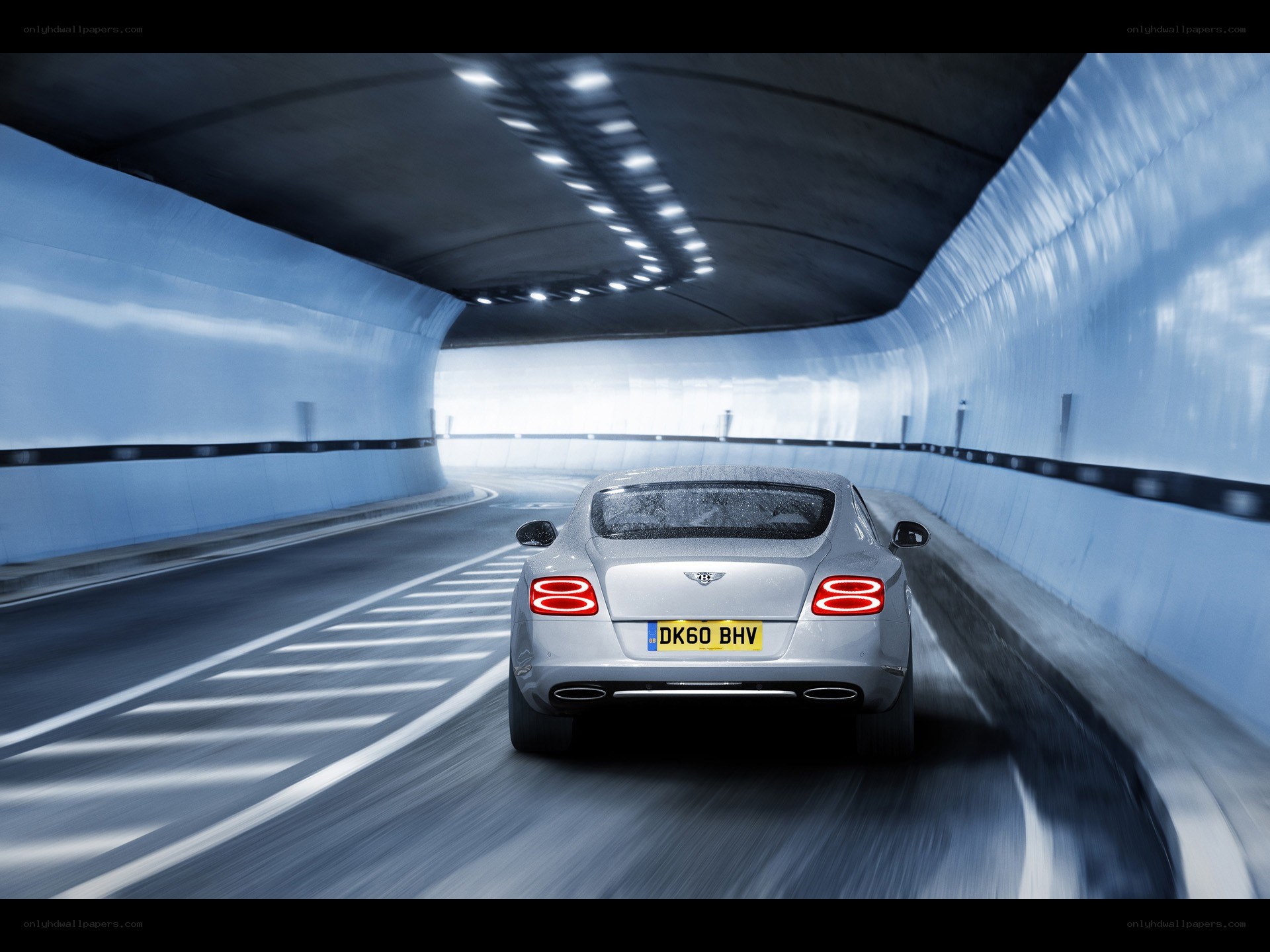 Bentley driving through tunnel