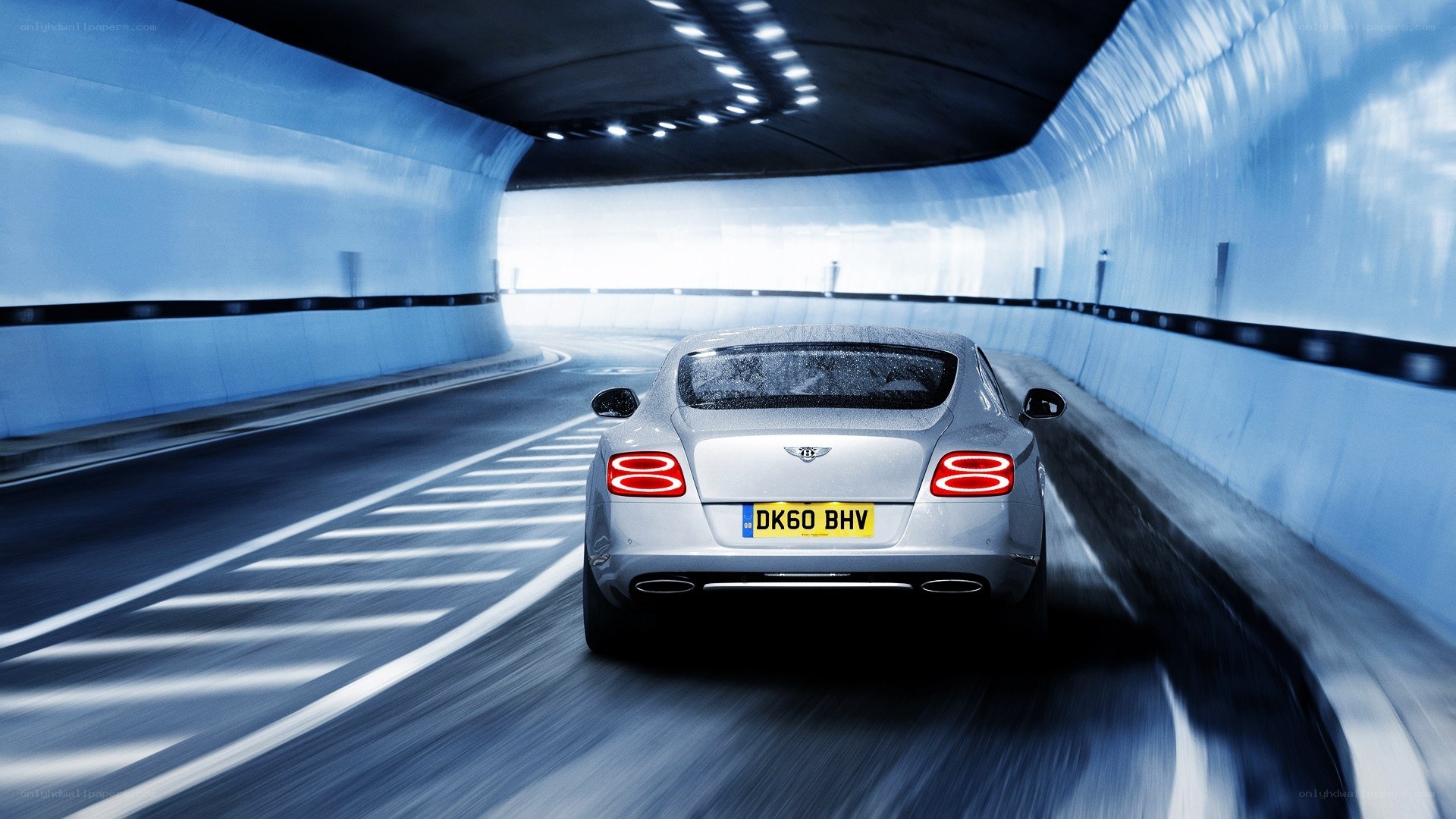 Bentley driving through tunnel