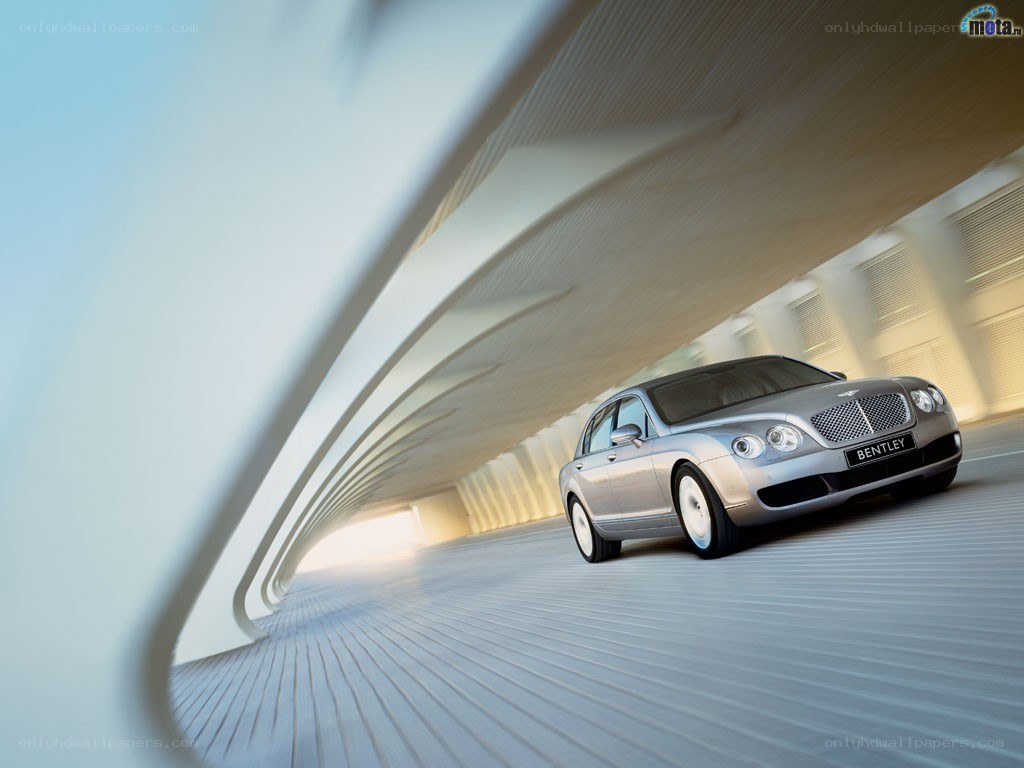 Bentley driving through tunnel