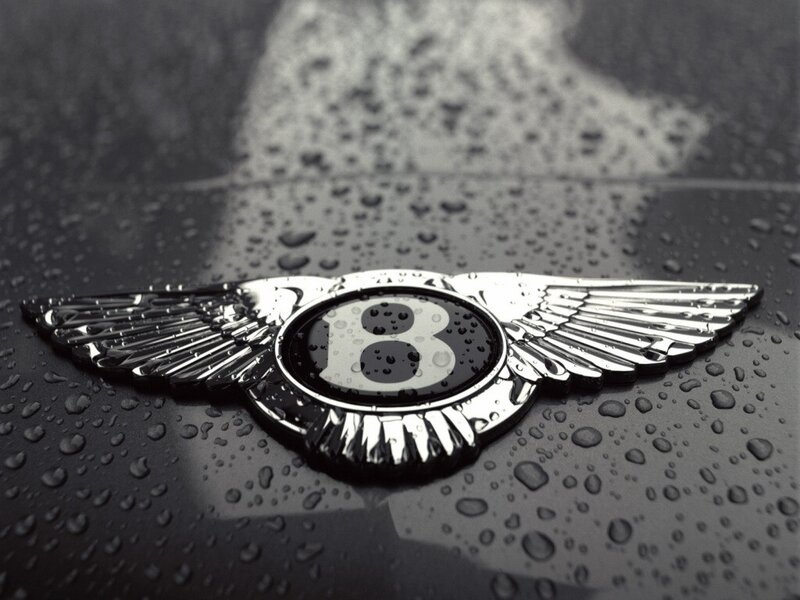 Bentley emblem on wet surface