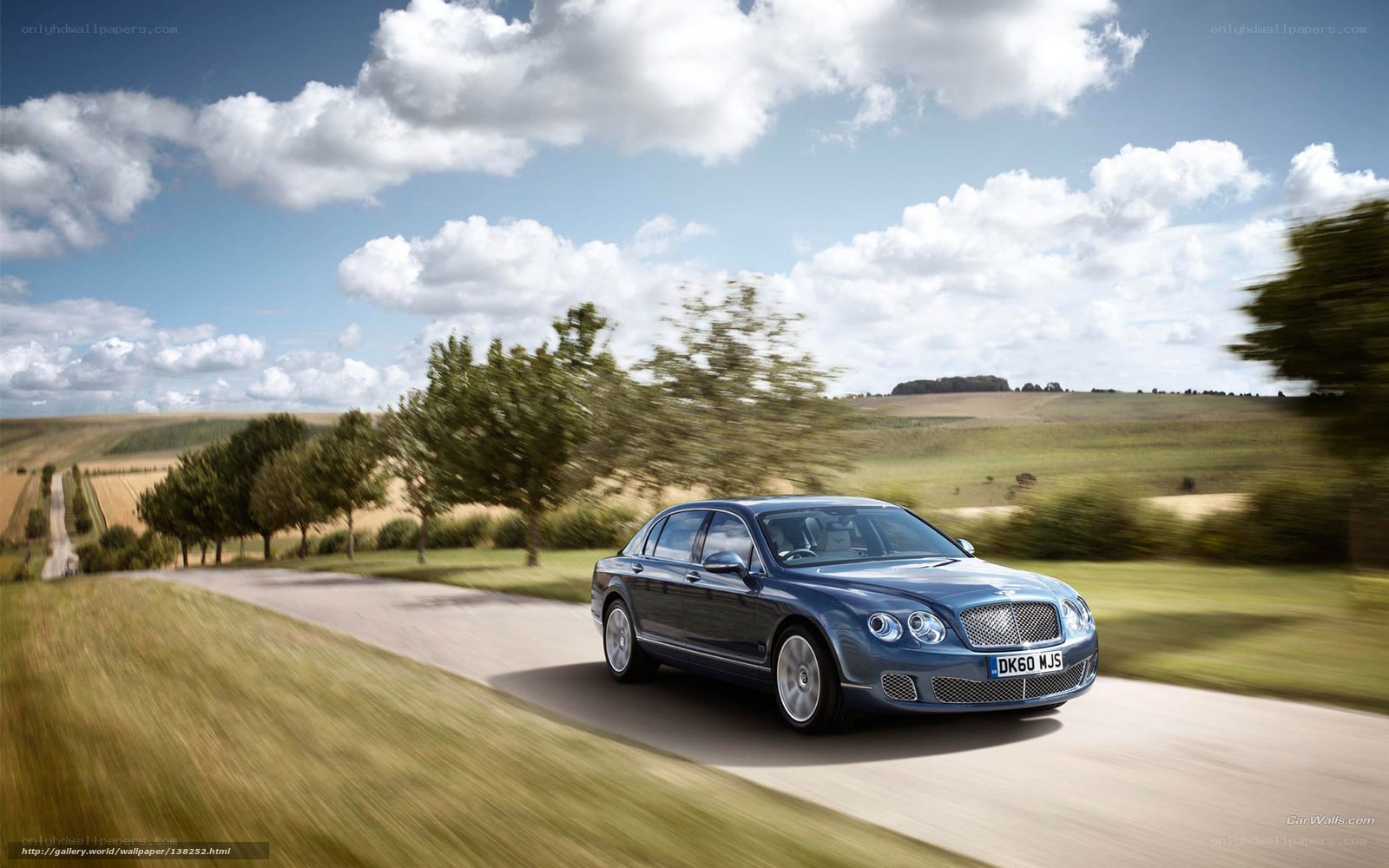 Bentley flying down country road