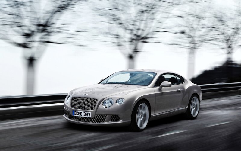 Bentley flying on a road