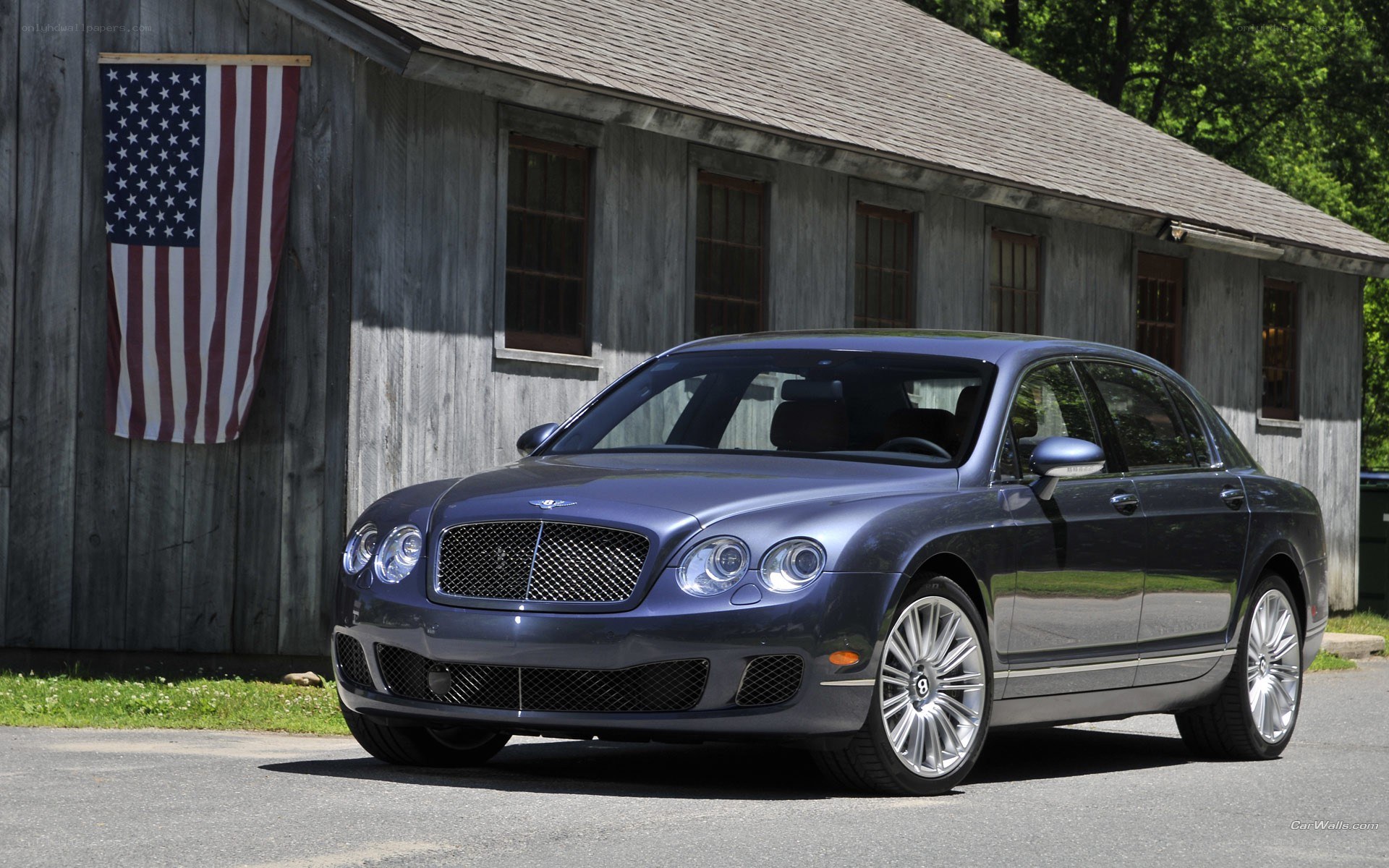 Bentley Flying Spur parked outside