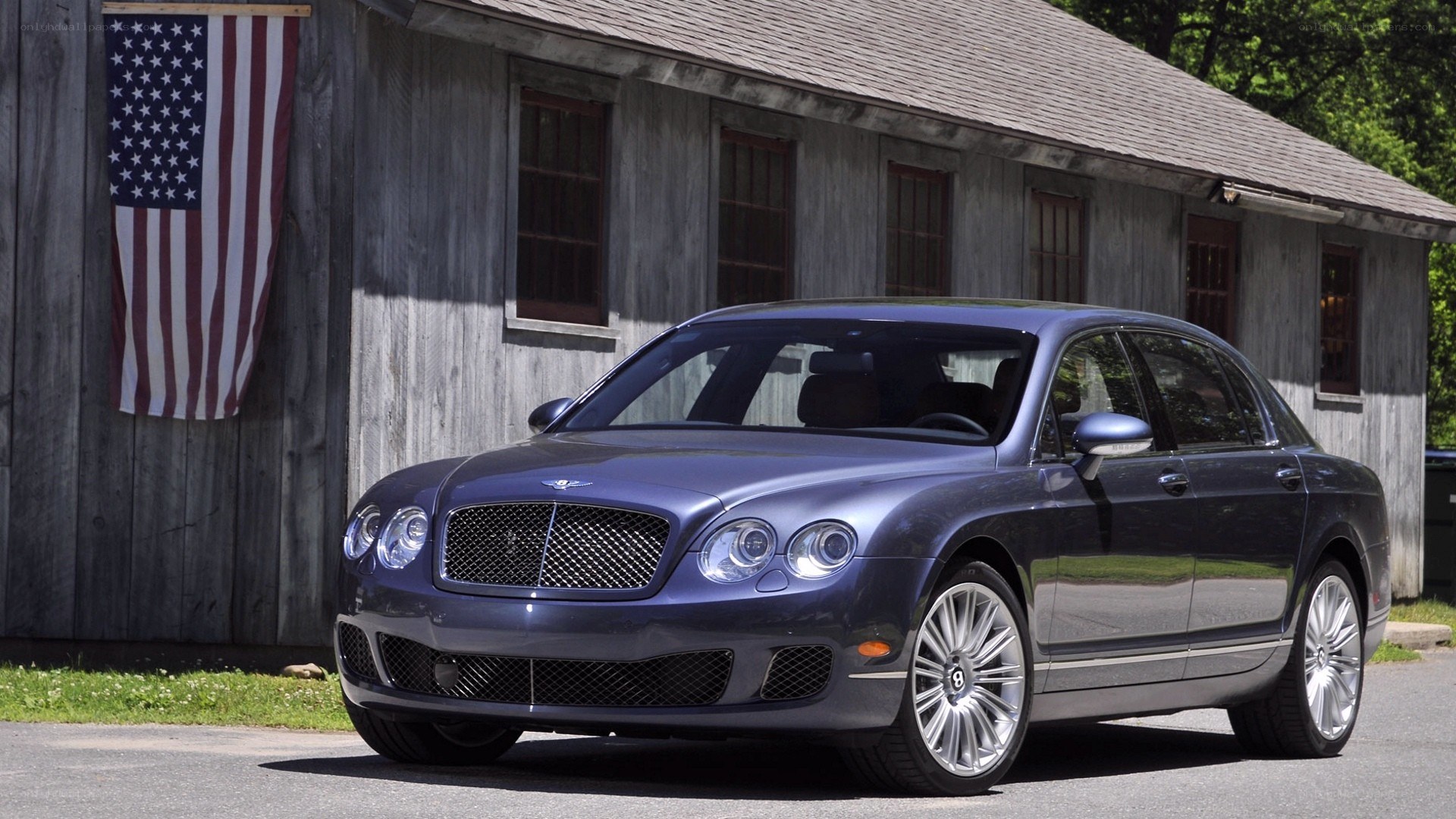 Bentley Flying Spur parked outside