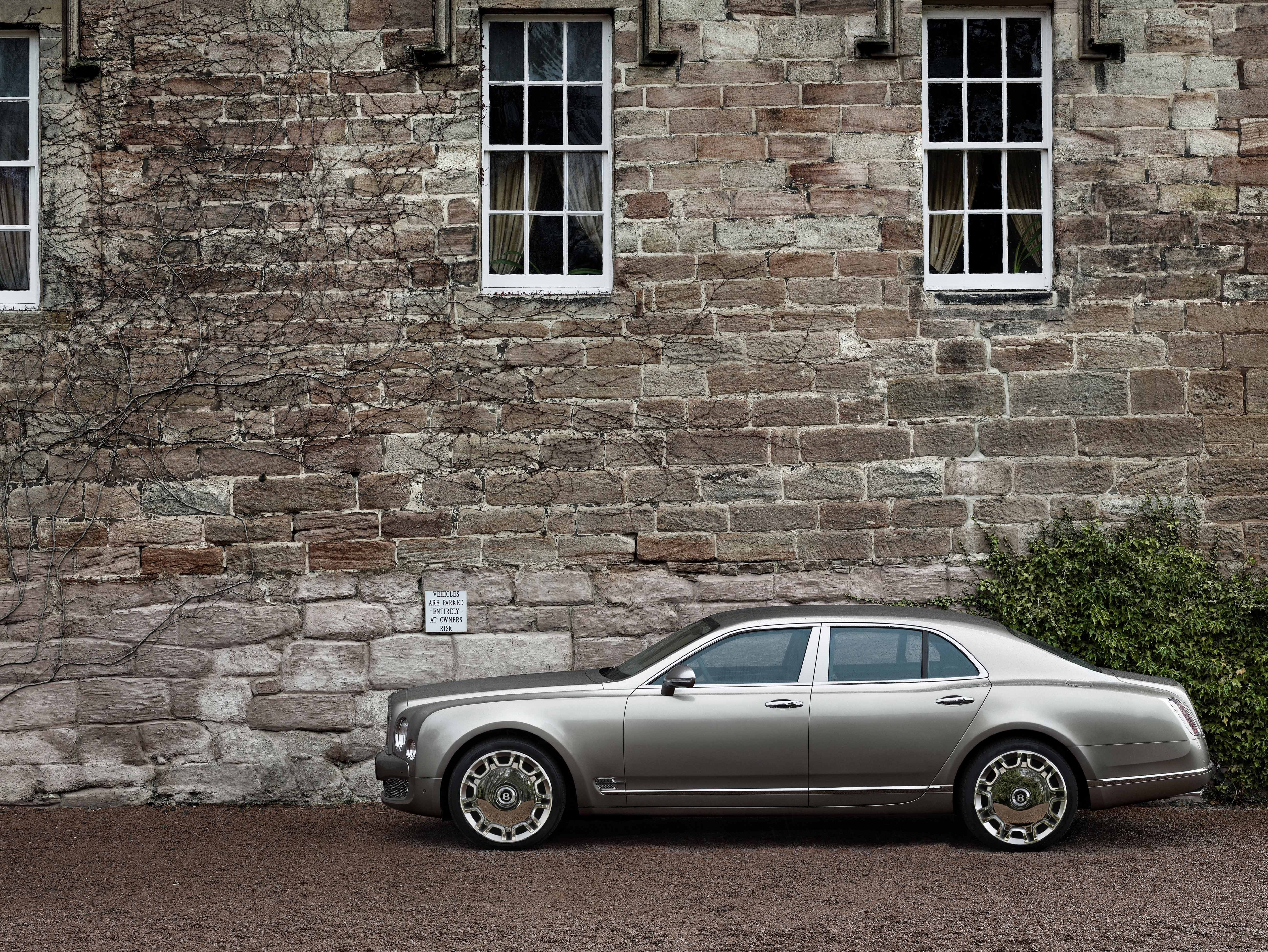 Bentley Mulsanne parked by stone wall
