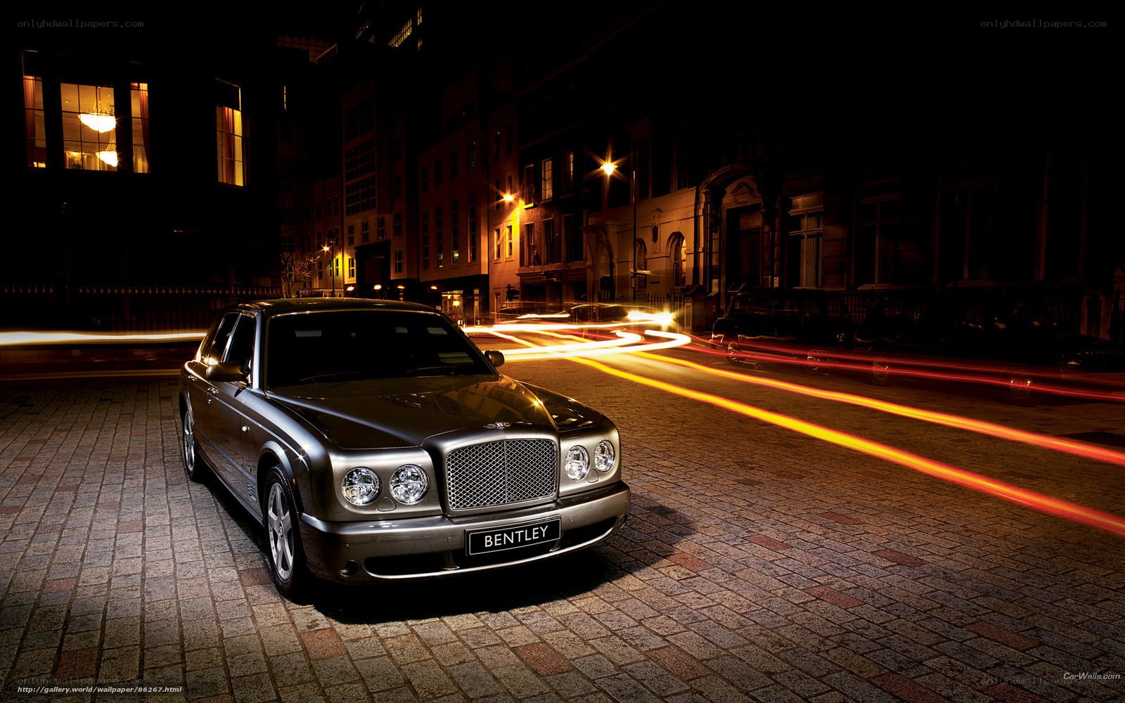 Bentley on a city street at night