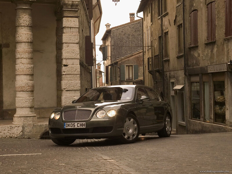 Bentley on a cobblestone street