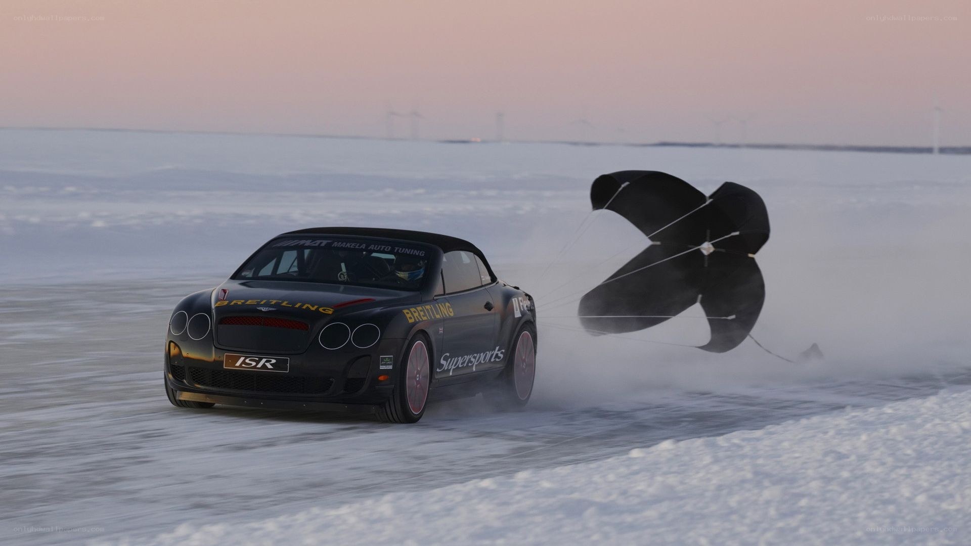 Bentley on ice with parachute