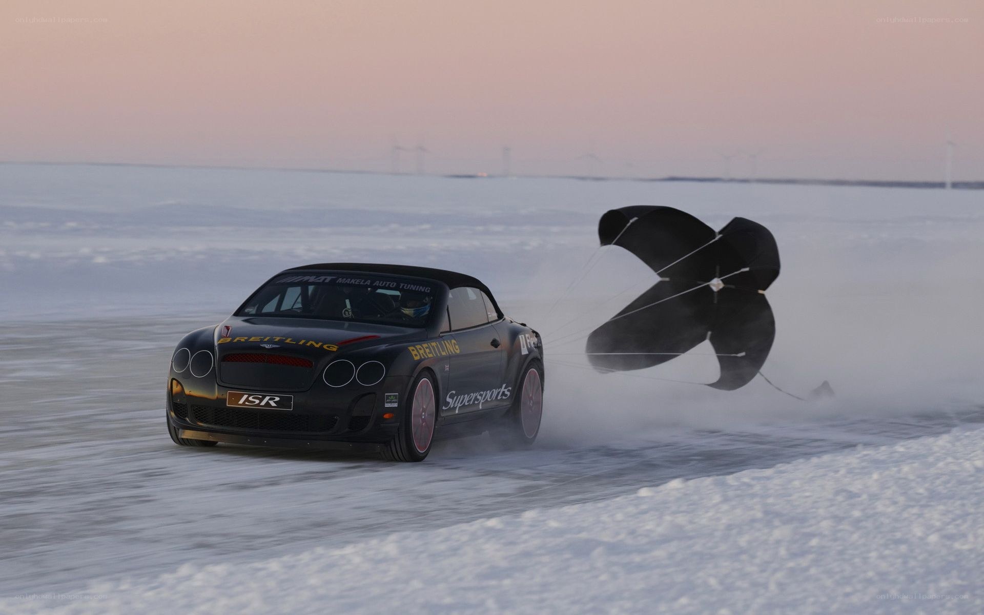 Bentley on ice with parachute