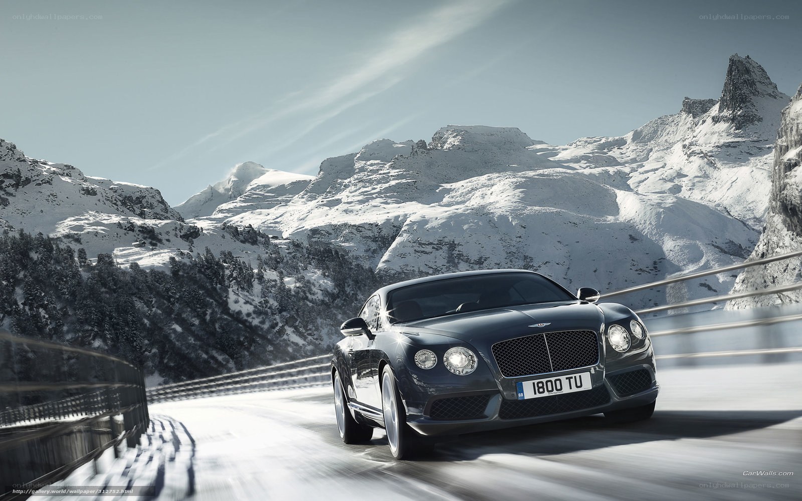 Bentley on snowy mountain road