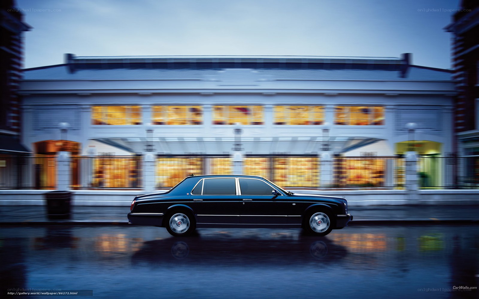 Bentley on wet city street