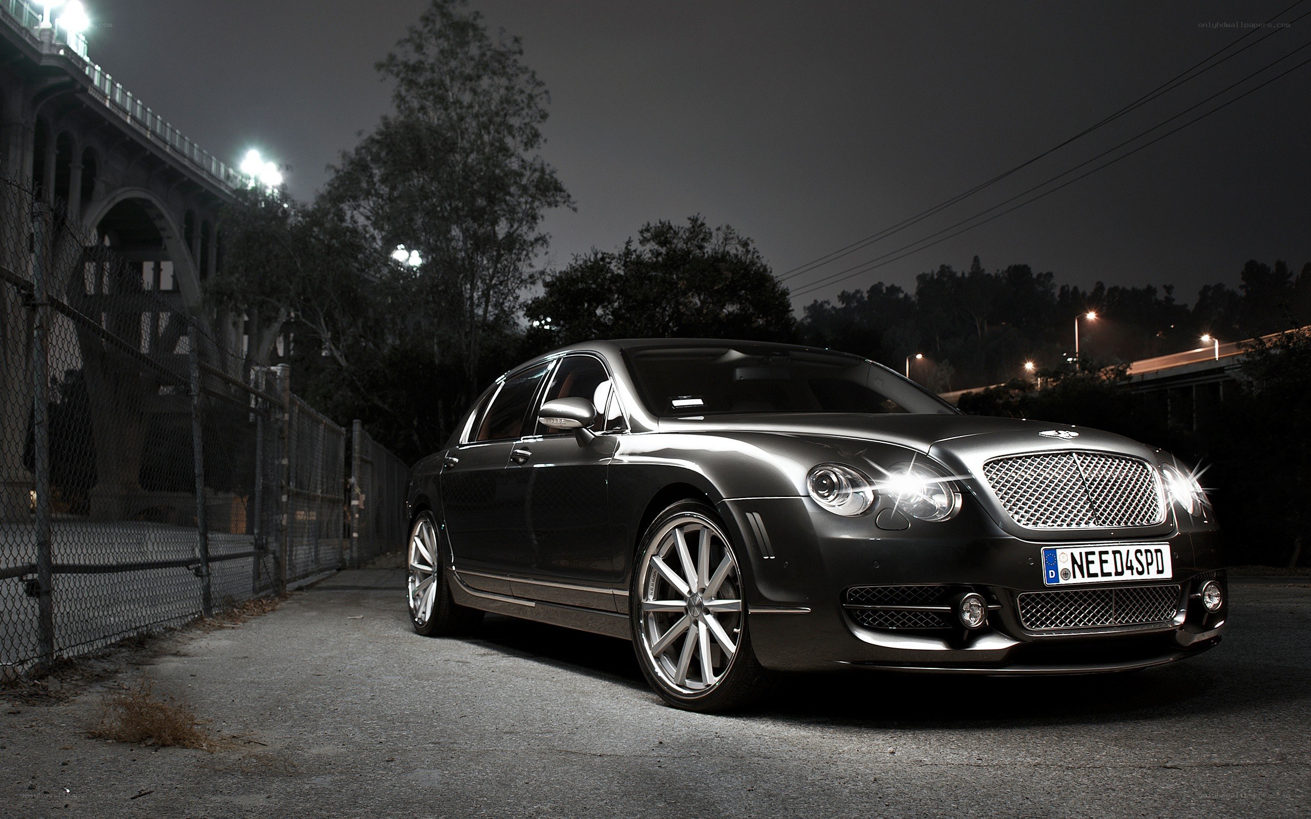 Bentley parked at night