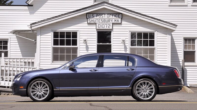 Bentley parked in front of post office