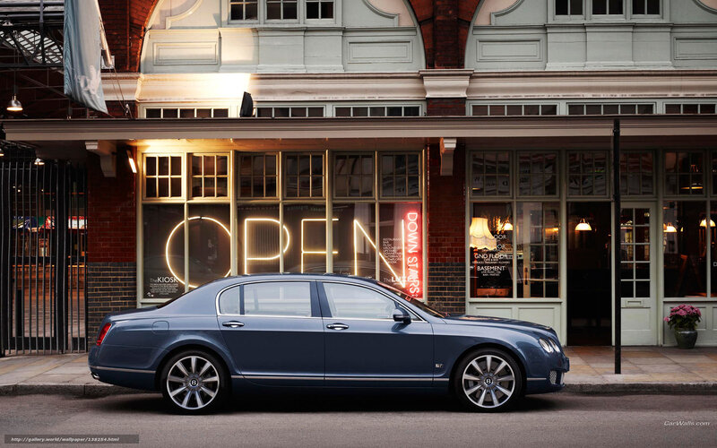 Bentley parked in front of shop