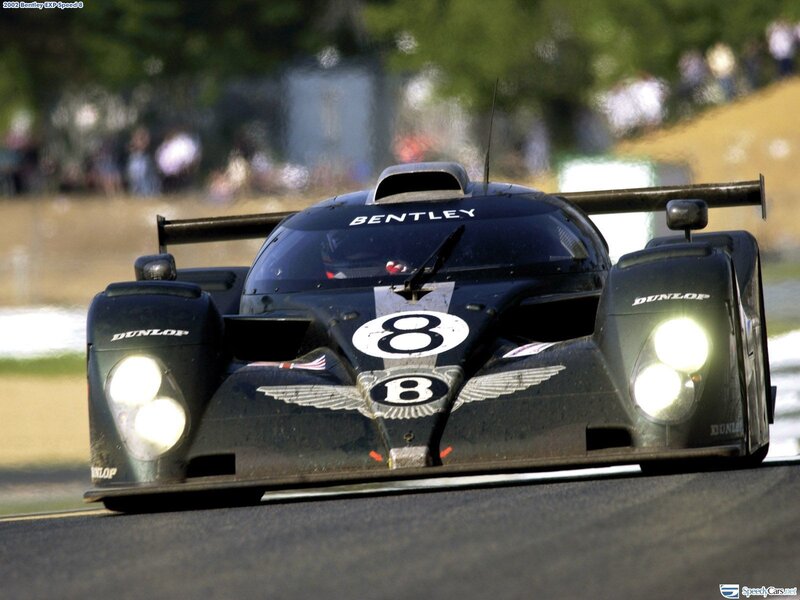 Bentley Race Car — Black, Dynamic, Afternoon, Photograph, Race Track, Crowd
