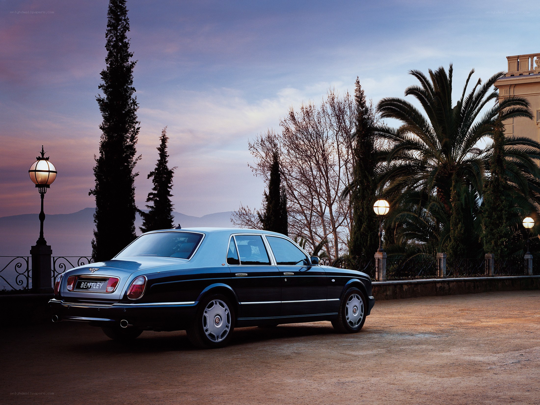 Bentley sedan at dusk