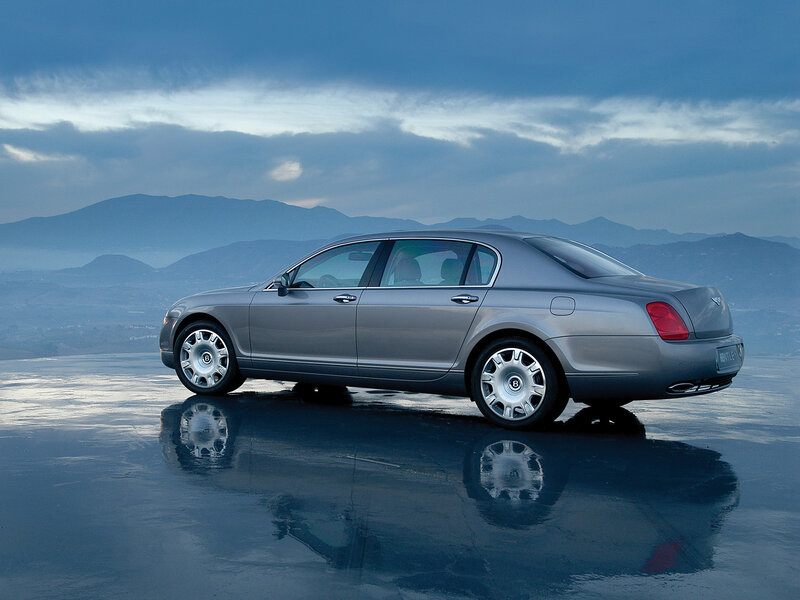 Bentley sedan on reflective surface