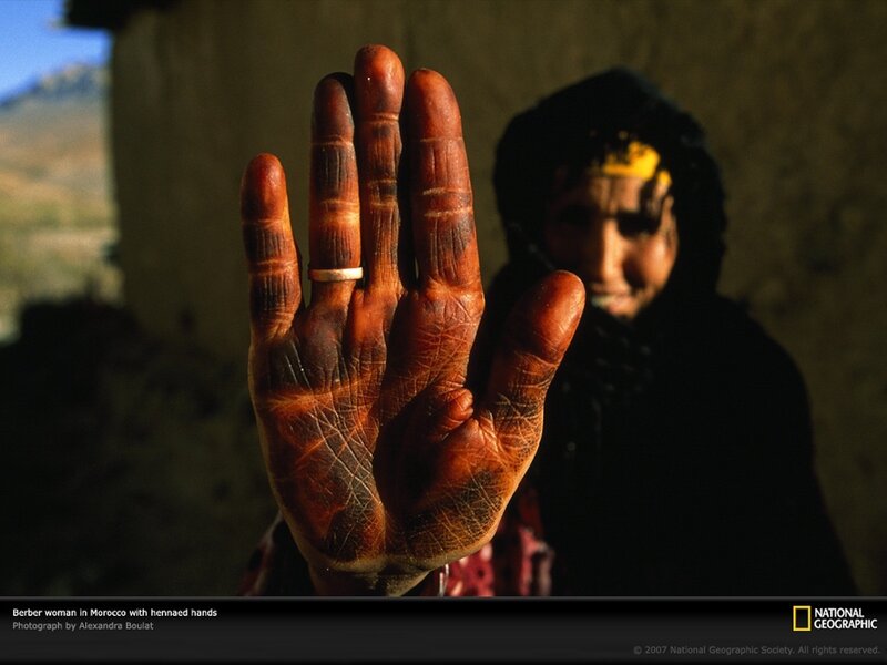 Berber woman with hennaed hands