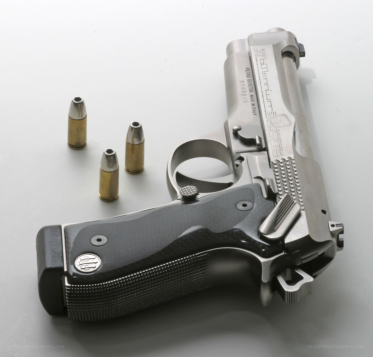 Beretta Millennium pistol with bullets
