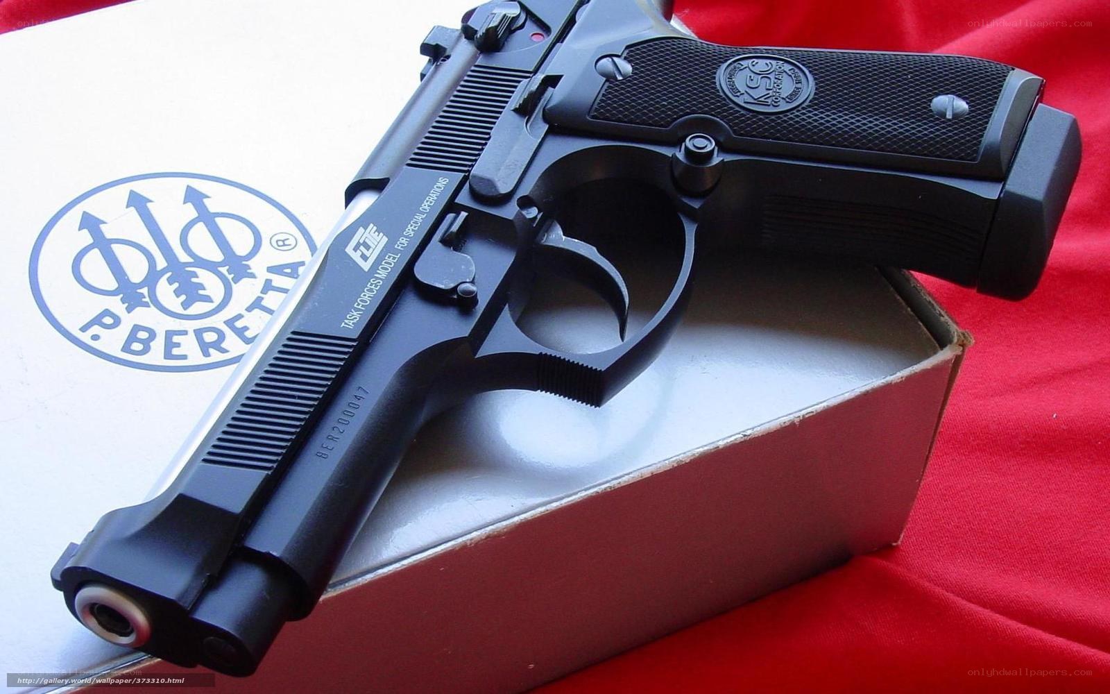 Beretta pistol on box
