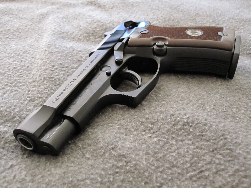Beretta pistol on carpet