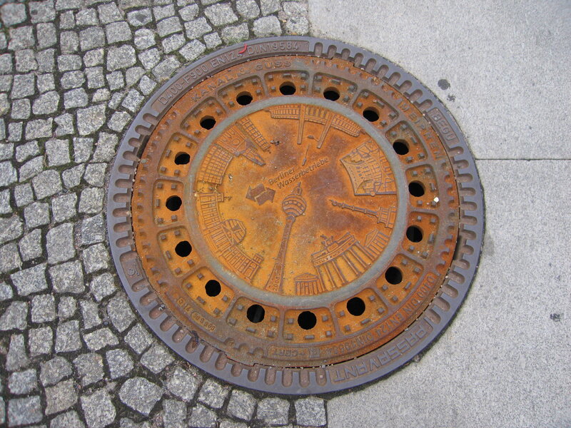 Berlin manhole cover with landmarks