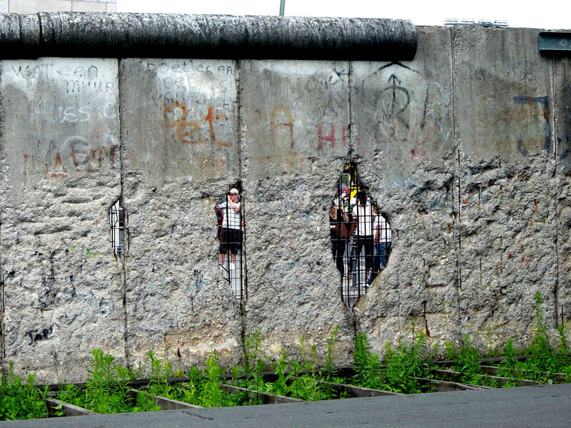 Berlin Wall with graffiti and holes