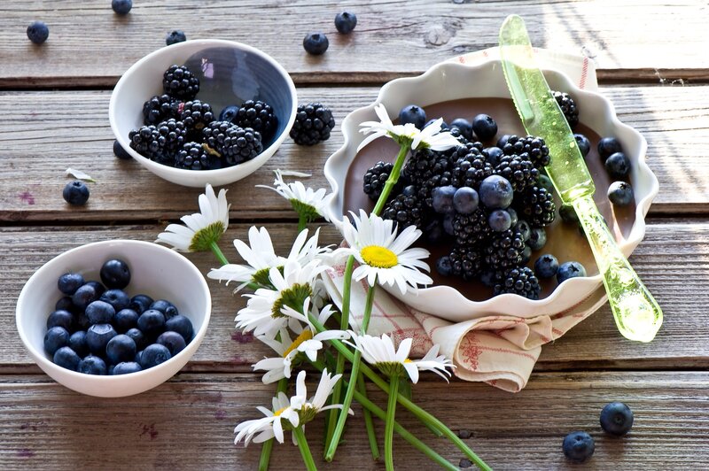 Berries and Daisies on Wood