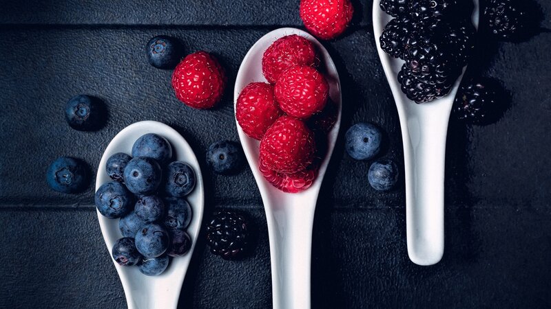 Berries in White Spoons