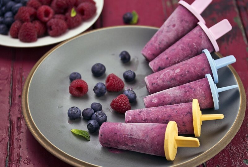 berry popsicles on plate