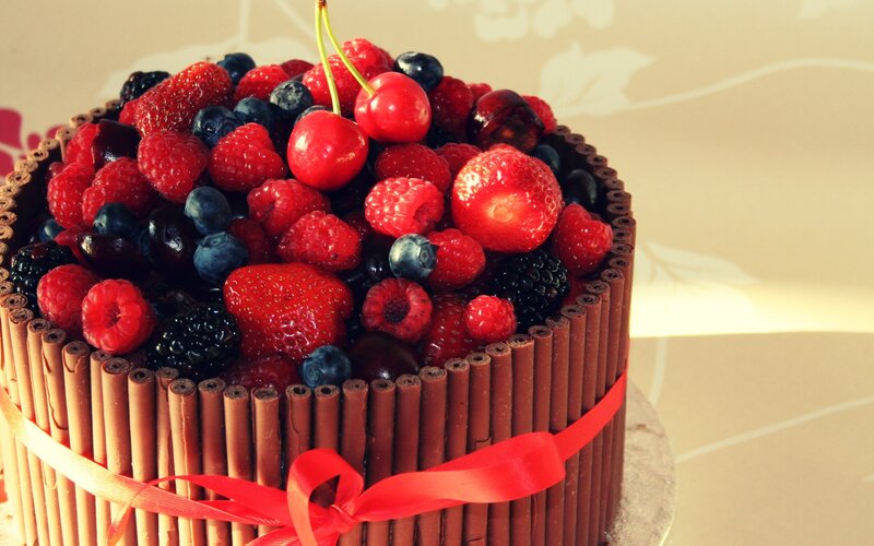 berry-topped chocolate cake