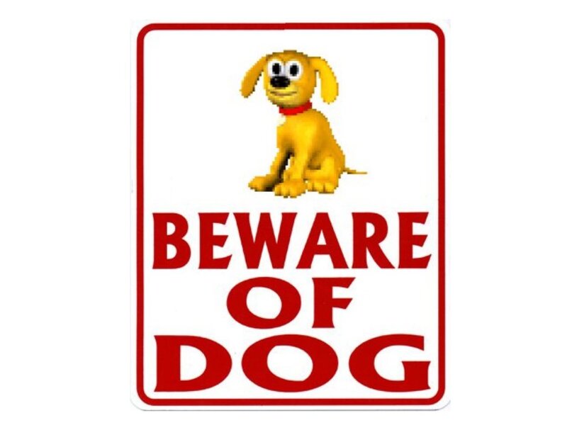 Beware of Dog sign with cartoon dog