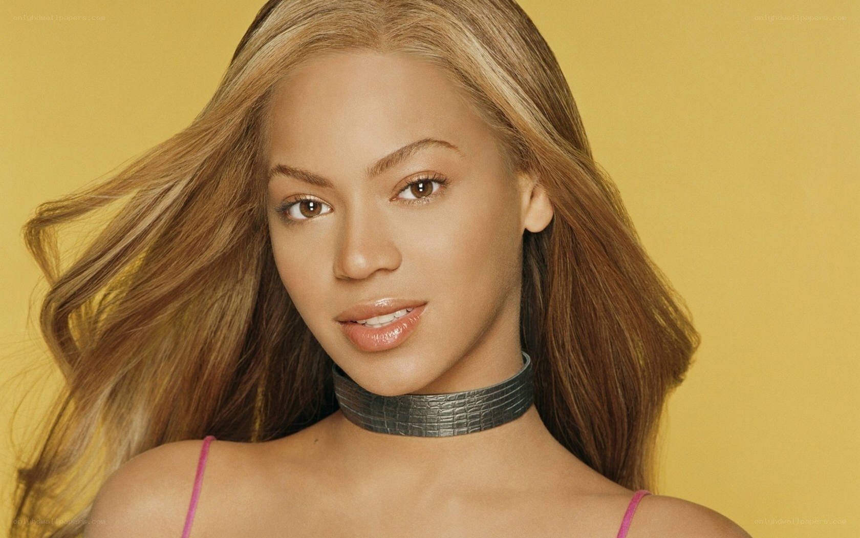 Beyoncé in a pink top