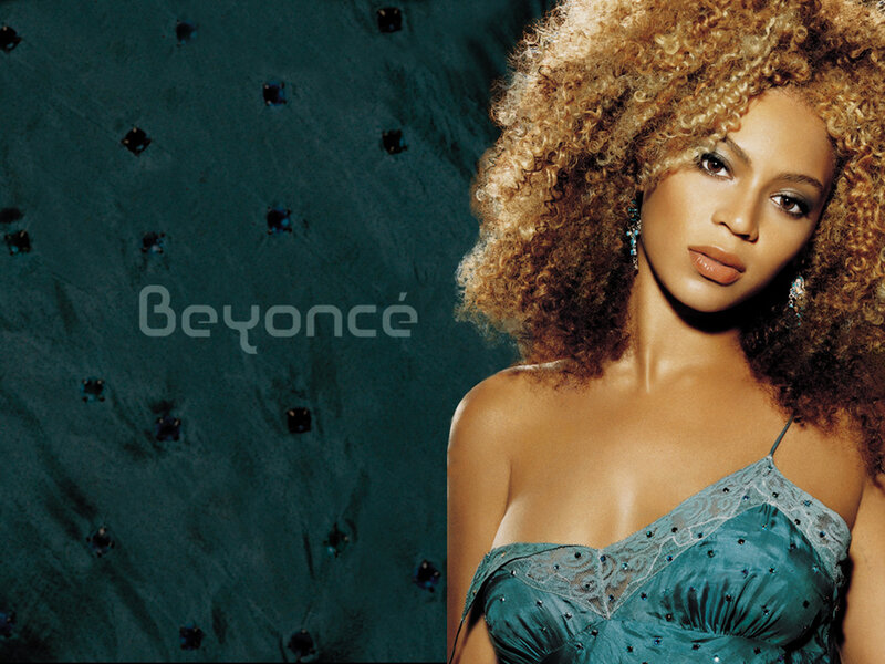 Beyoncé in a teal dress