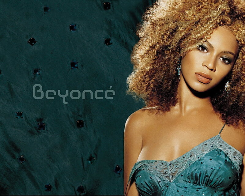 Beyoncé in a teal dress