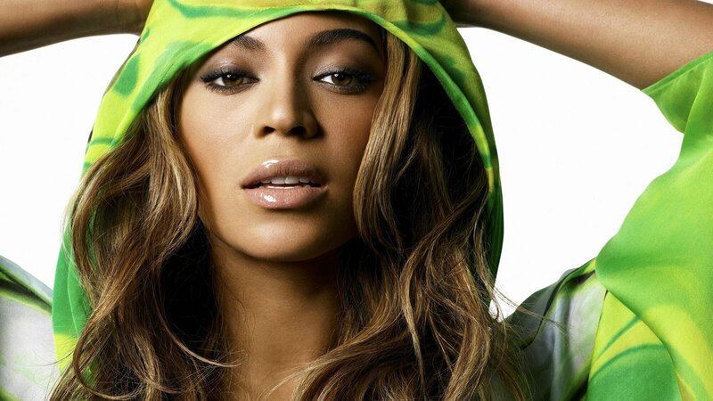 Beyoncé in green hooded garment