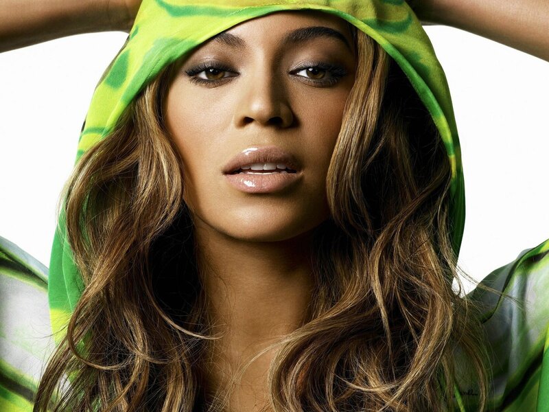 Beyoncé in green hooded garment