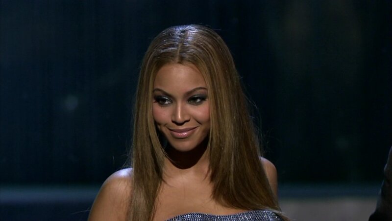 Beyoncé on stage smiling