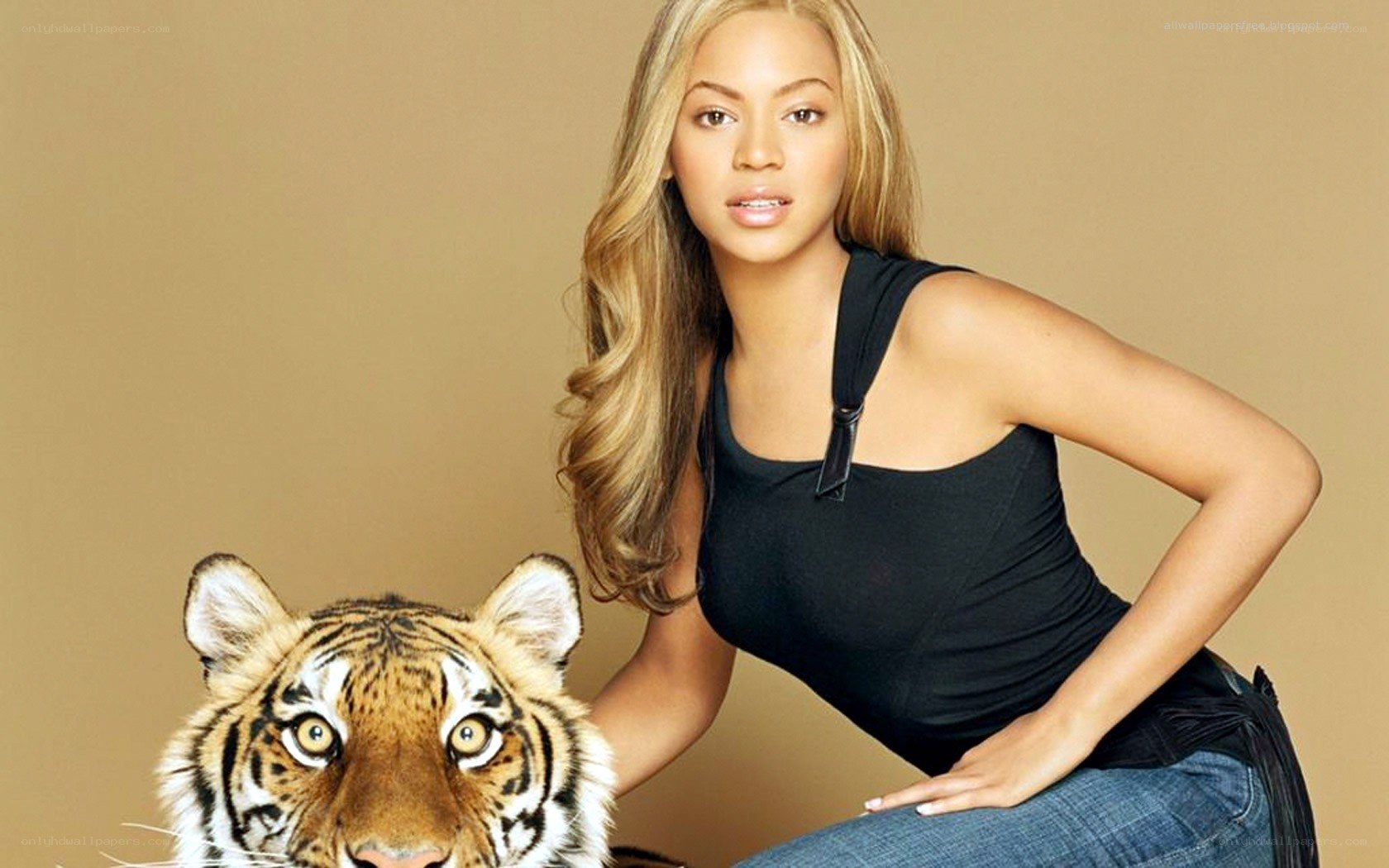 Beyoncé with a tiger cub