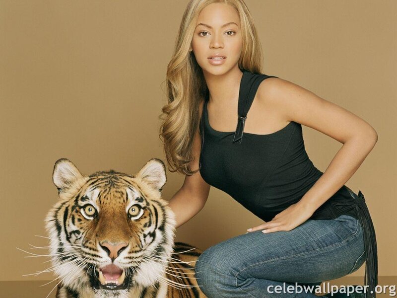 Beyoncé with a tiger cub