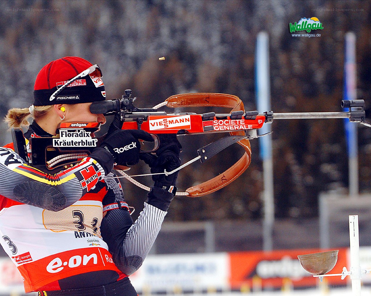 Biathlete shooting during competition
