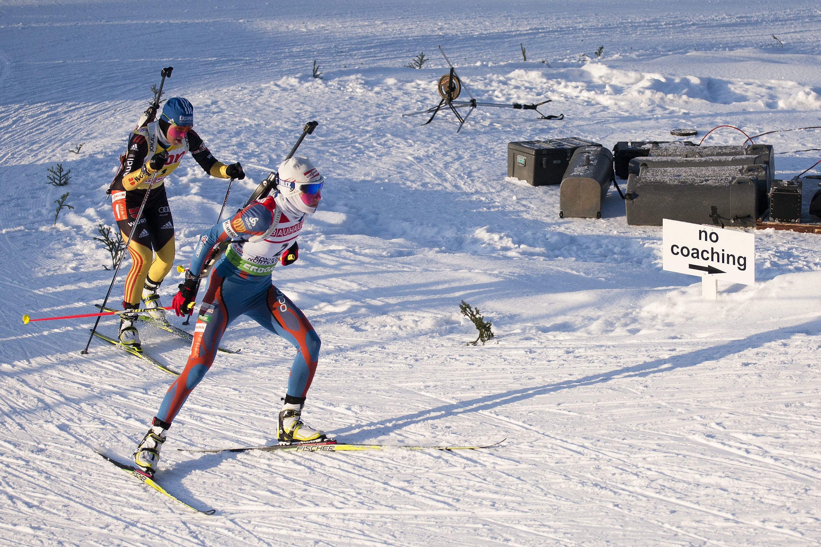 Biathlon skiers in action