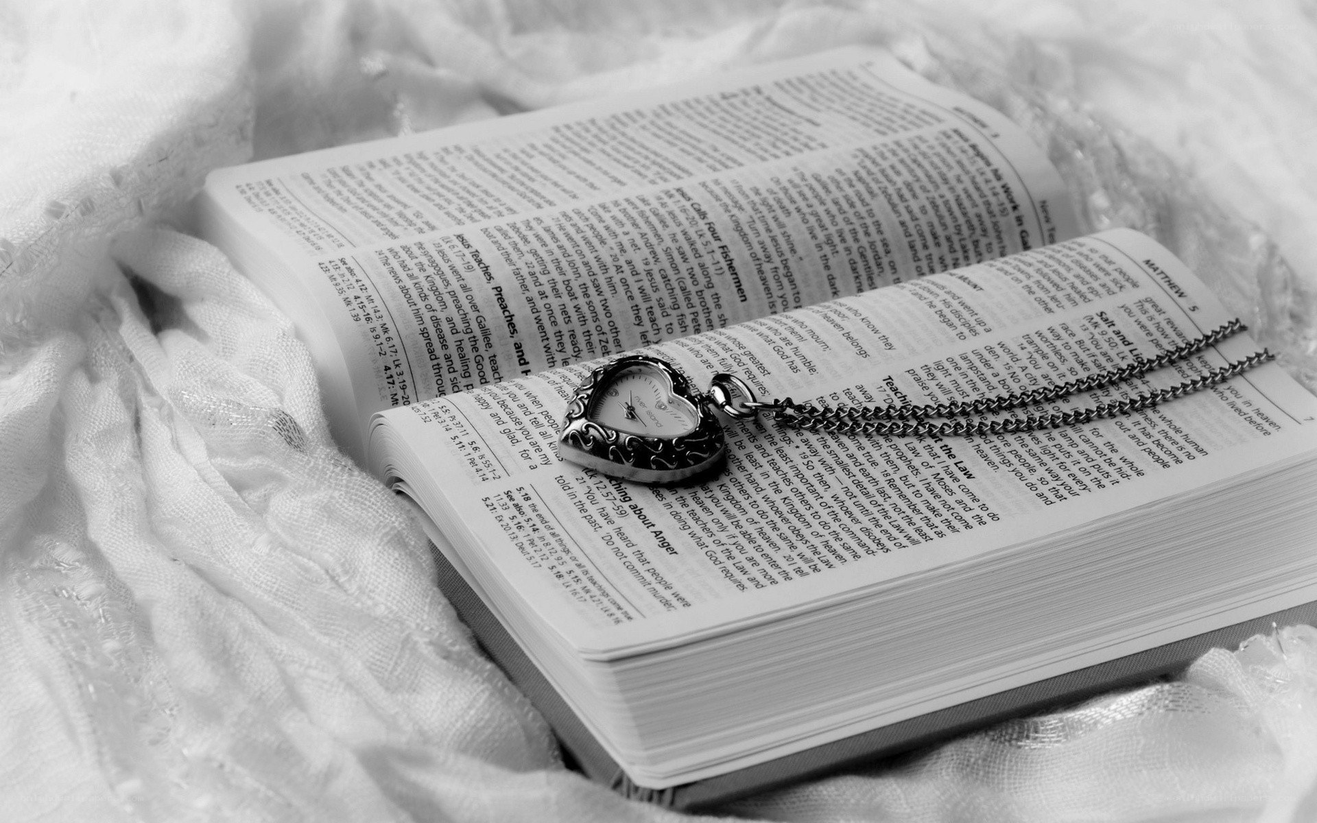 Bible with heart-shaped locket