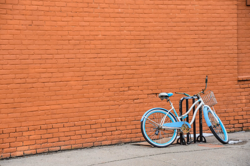 Bicycle against brick wall