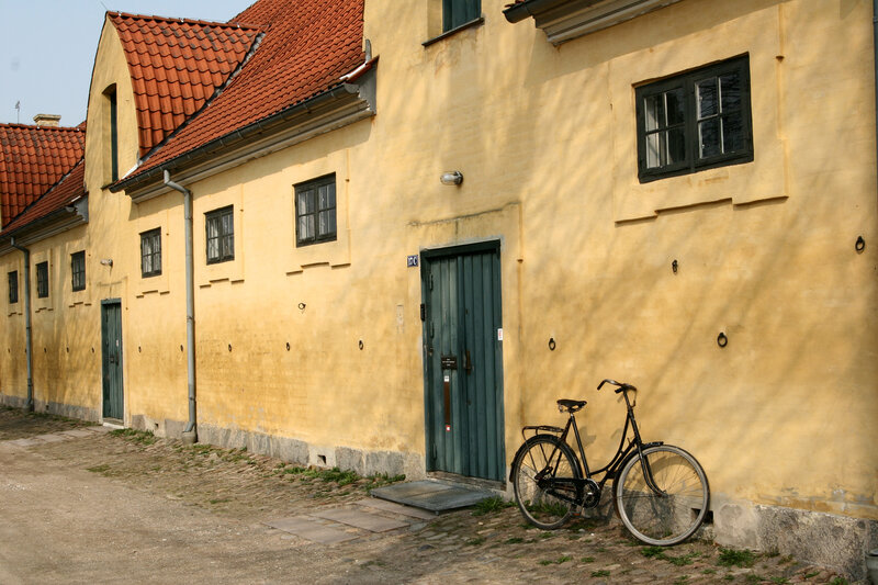 Bicycle Against Building — Yellow