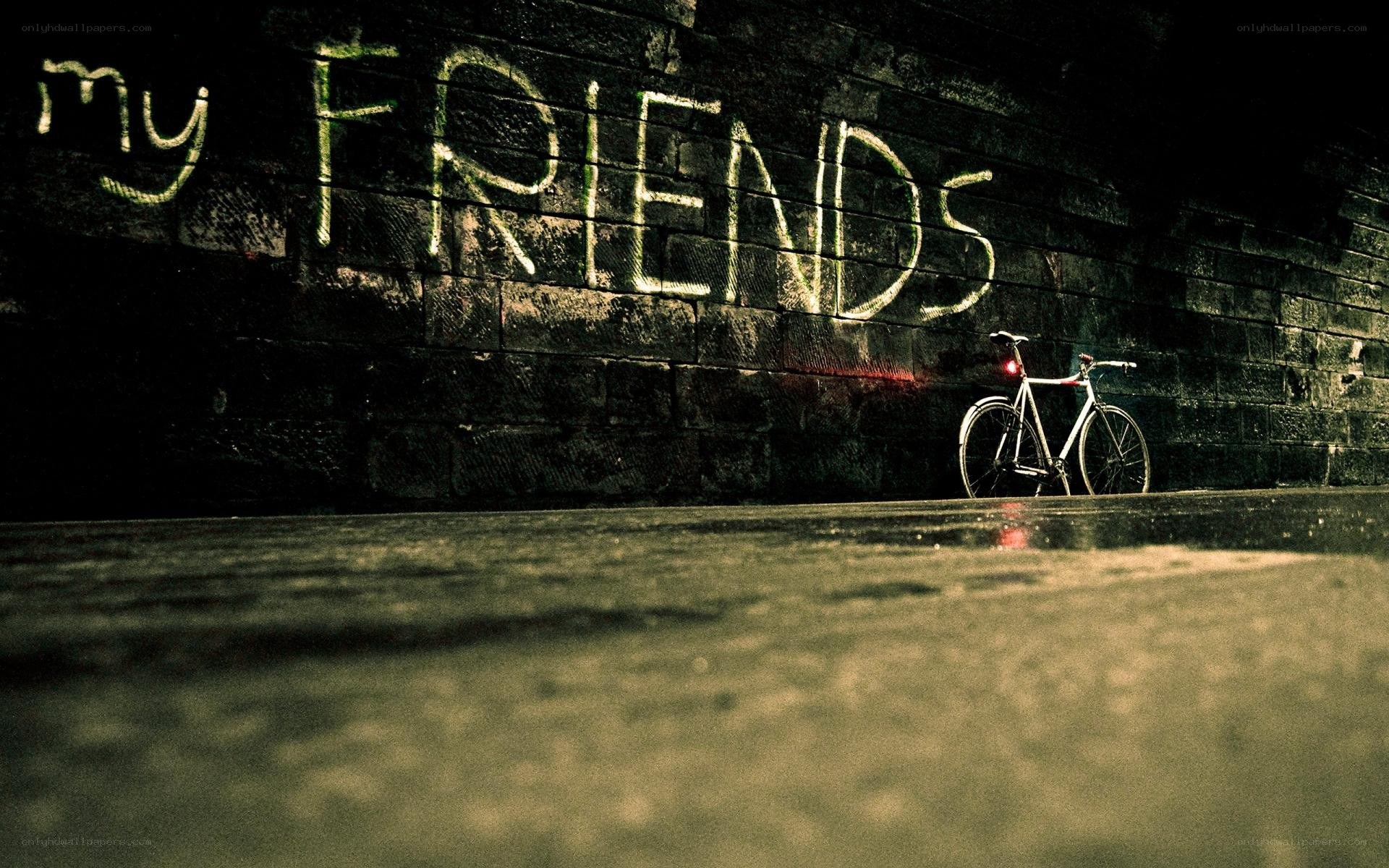 Bicycle against graffiti wall