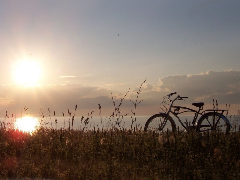Bicycle at sunset by the sea