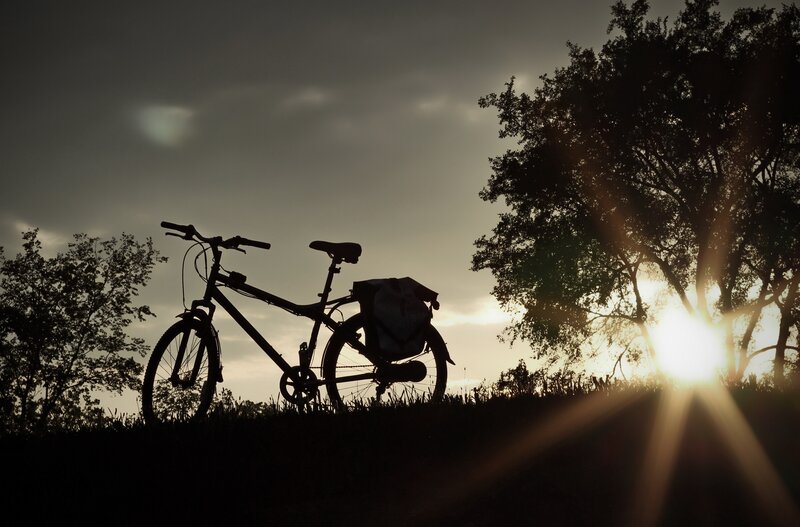 Bicycle at sunset silhouette